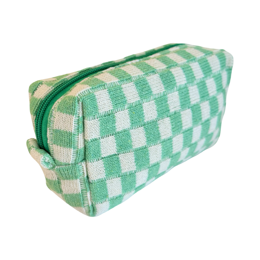 side view of a light green and beige checkered cosmetic bag