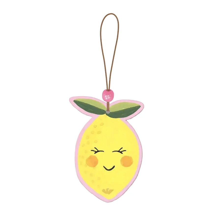 Lemon-shaped car air freshener with a smiling face, green leaves at the top, and a hanging cord.