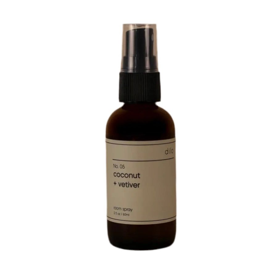 Coconut + Vetiver No 05 Room Spray in a dark glass bottle with dilo branded label.