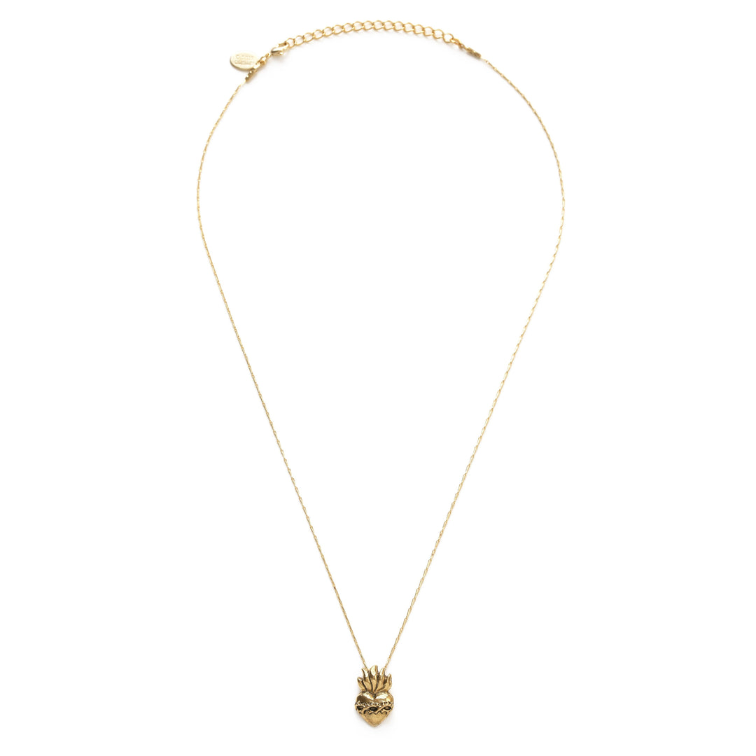 a gold sacred heart pendant necklace with a gold chain. Brand: Amano Studio