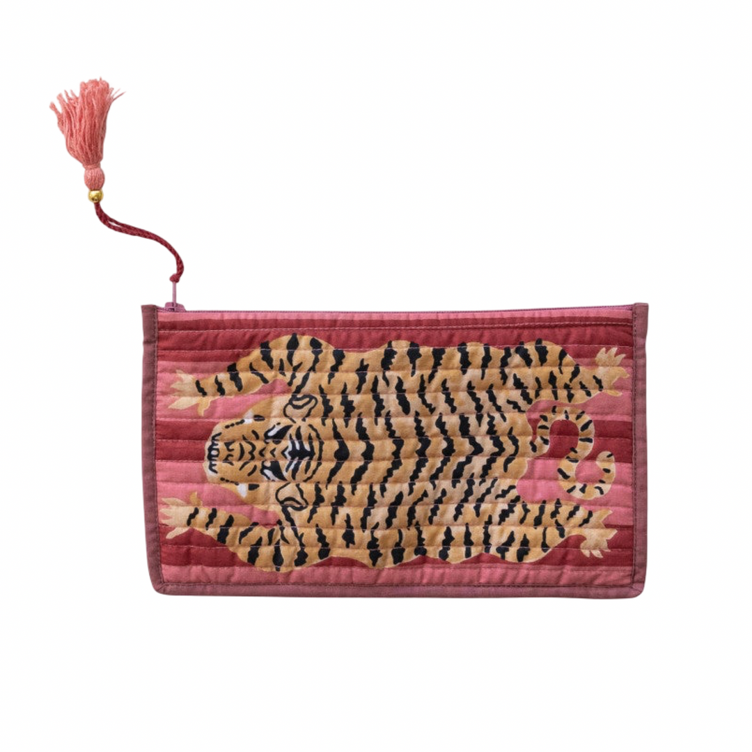Berry colored quilted zip pouches with a tiger print and tassel zipper pulls.