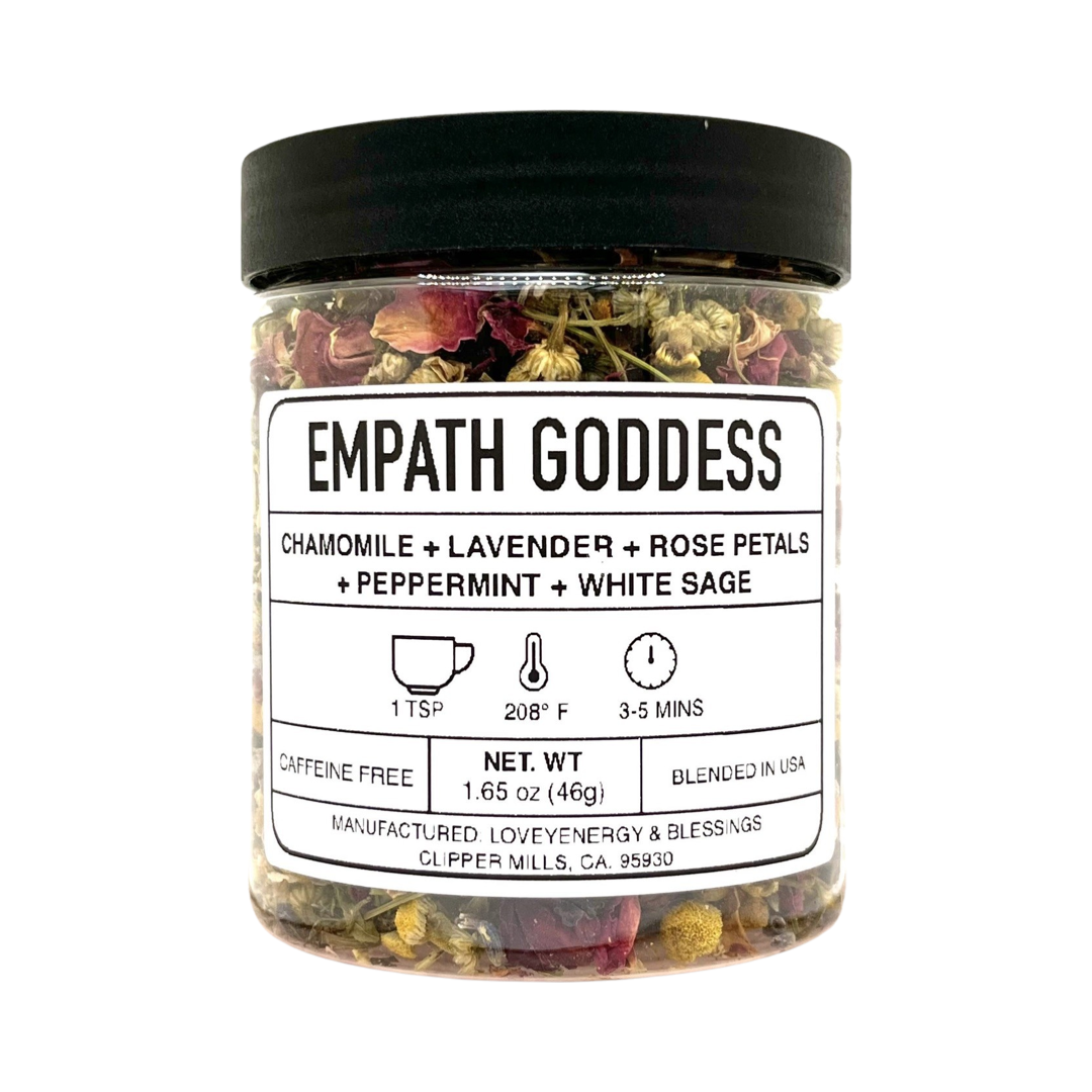1.65 oz clear jar of tea featuring dried flowers and herbs with a white branded label. Brand: Loveyenergy & Blessings