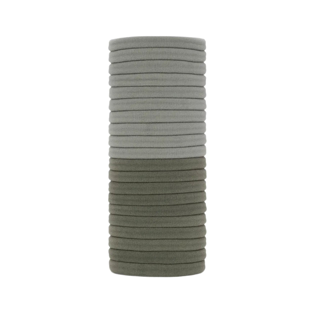 stack of light sage and dark sage elastic hair ties. Brand: Kitsch