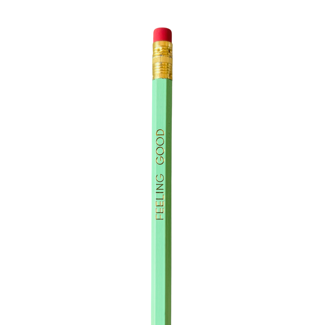 A green pencil with the phrase 'FEELING GOOD' printed in gold lettering on the side, topped with a red eraser.
