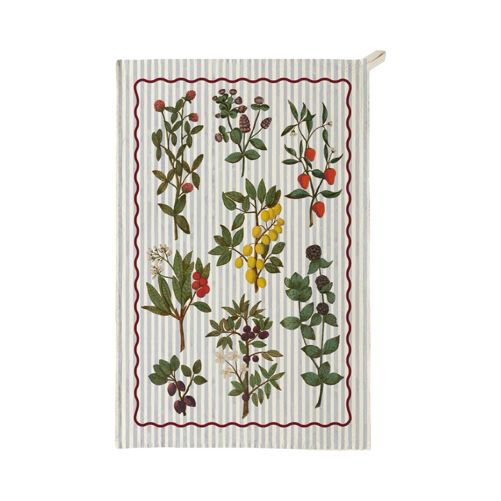 Tea towel featuring illustrated botanical branches with fruits and berries arranged on a striped background with a decorative border.