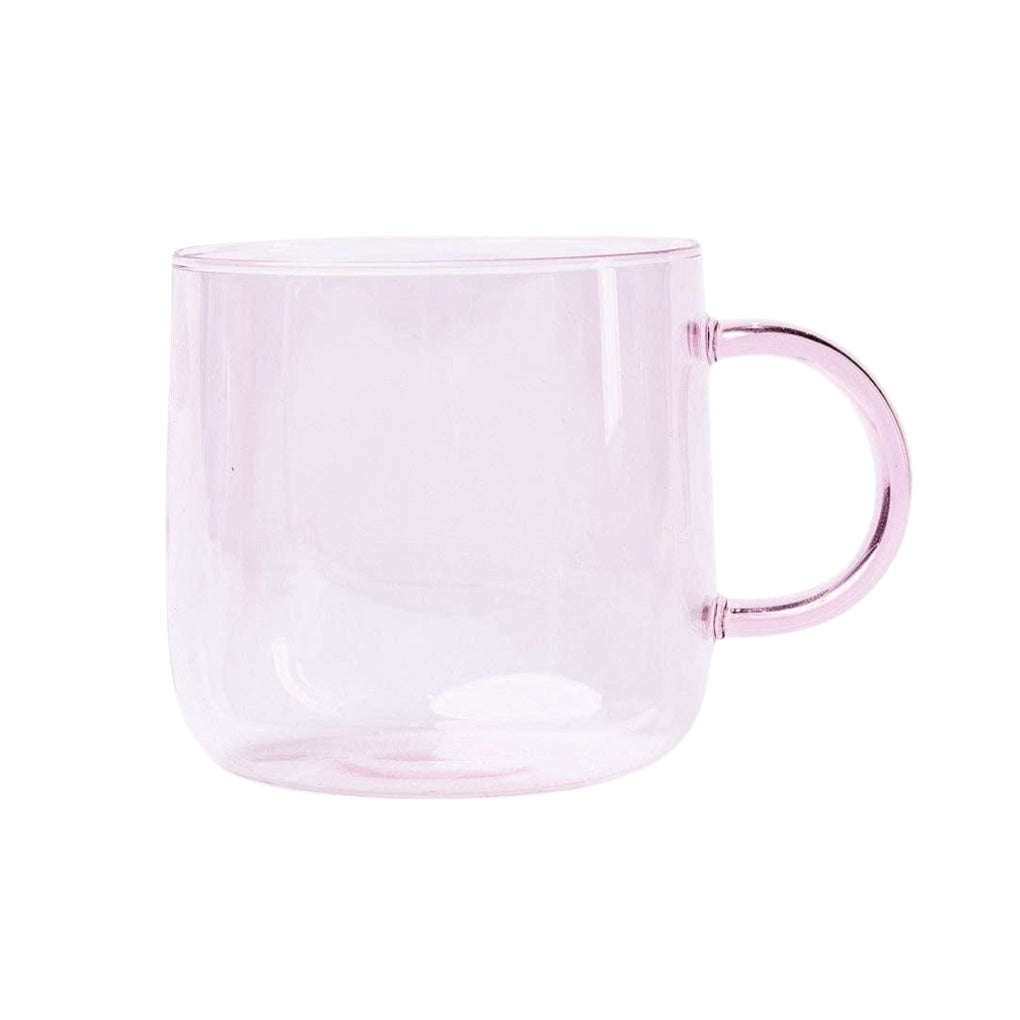 Light pink colored glass mug with a handle