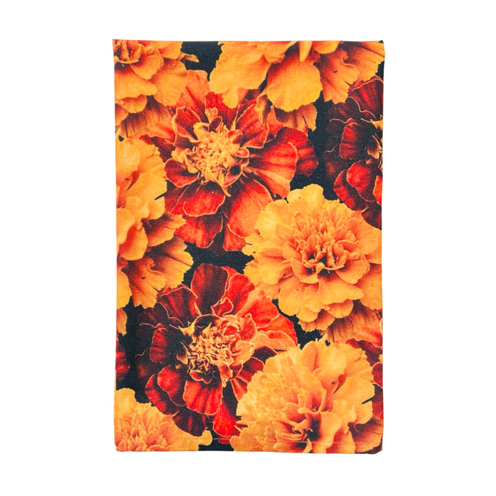 Quarter folded kitchen towel featuring a realistic marigold image