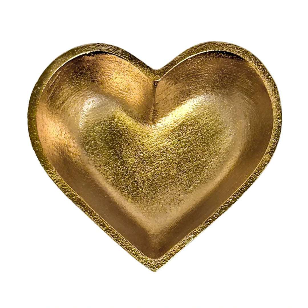 Gold metal heart-shaped trinket bowl with a smooth, textured finish.