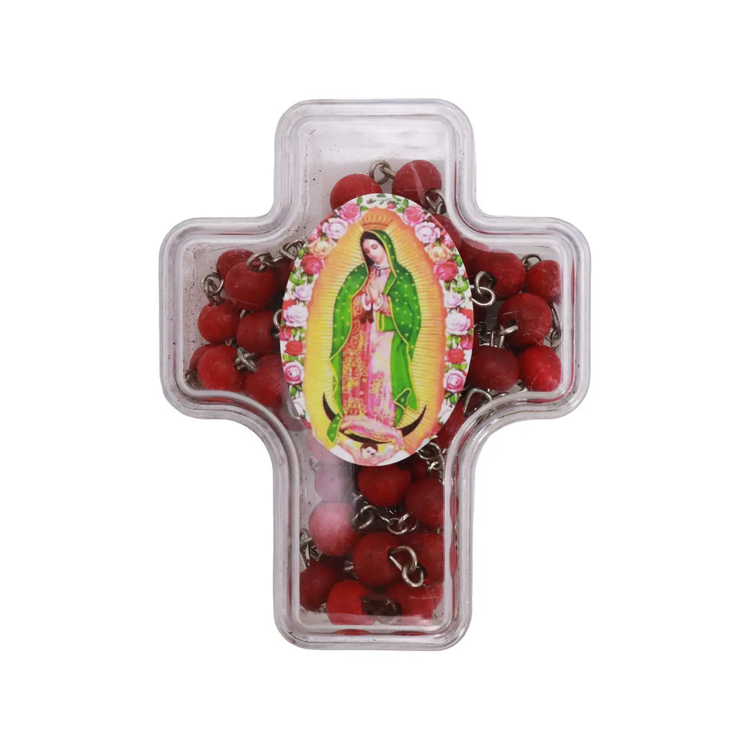 Clear cross-shaped storage case printed with an image of Our Lady of Guadalupe surrounded by roses.