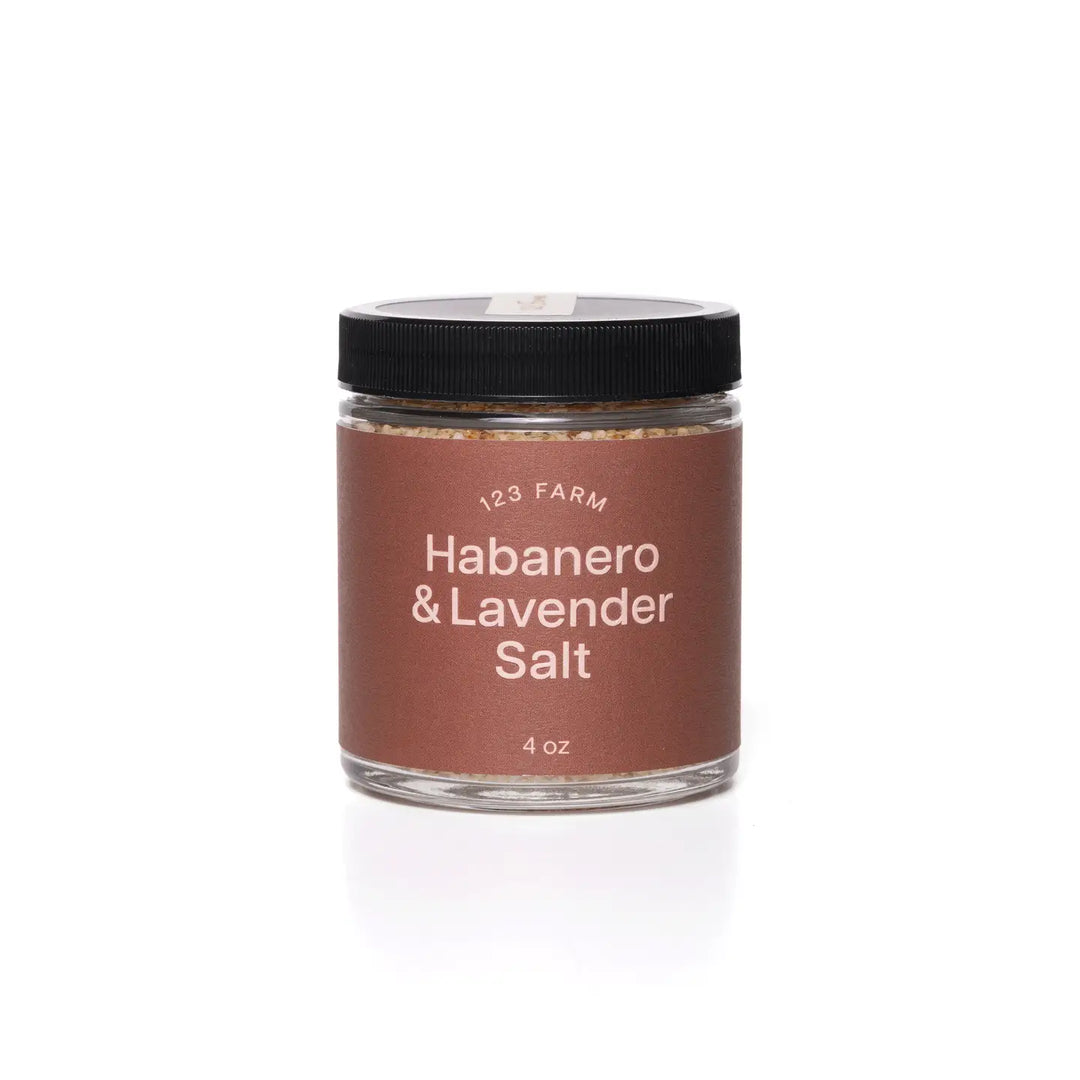 4 oz glass jar labeled "123 Farm Habanero & Lavender Salt" with a black lid and minimalist brown label.