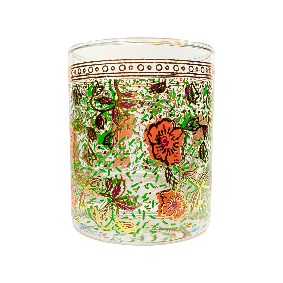 Clear glass featuring intricate floral designs in vibrant hues of orange, green, and pink with gold accents.