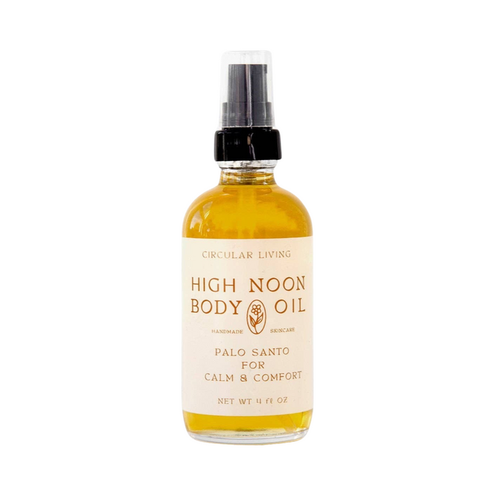 clear 4 oz bottle of high noon body oil with a beige branded label. Brand: Circular Living