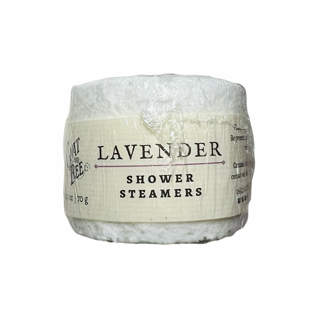 A pack of lavender shower steamers wrapped in biodegradable packaging, labeled "Lavender Shower Steamers" for a calming and aromatic shower experience.