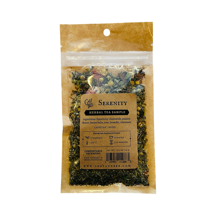 A resealable pouch of Serenity Herbal Tea Sample, a caffeine-free blend featuring spearmint, chamomile, passionflower, lemon balm, rose, lavender, and cinnamon, packaged in compostable materials.