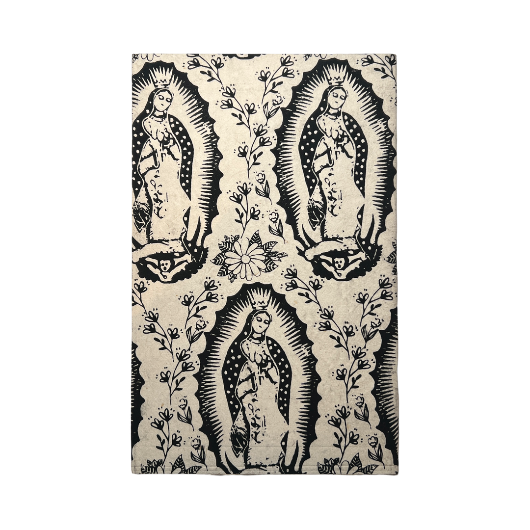 Cream notebook featuring a Our Lady of Guadalupe repeated pattern