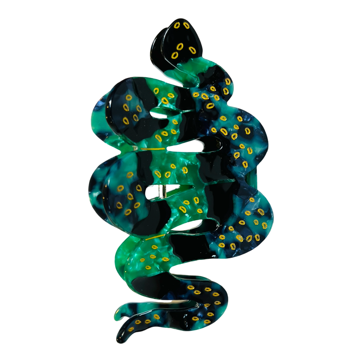 Snake-shaped hair claw clip with green and black patterns, golden accents