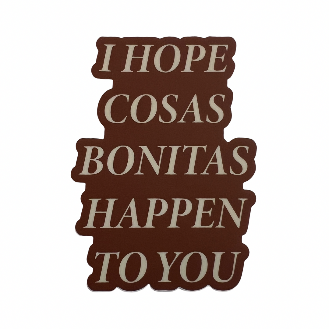 Brown sticker with the phrase I Hope Cosas Bonitas Happen To You in cream lettering.