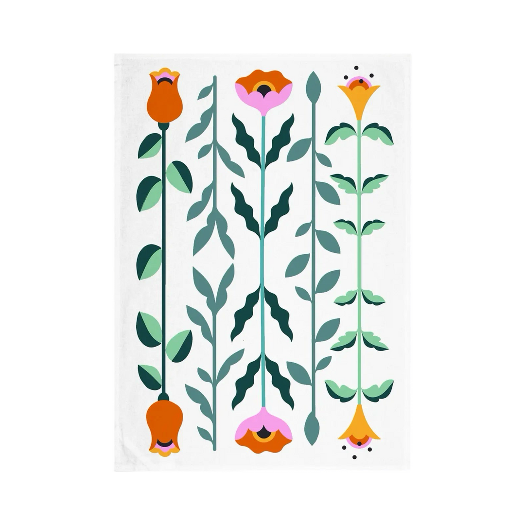 white towel with a floral design that features pink, orange and dark orange colors.