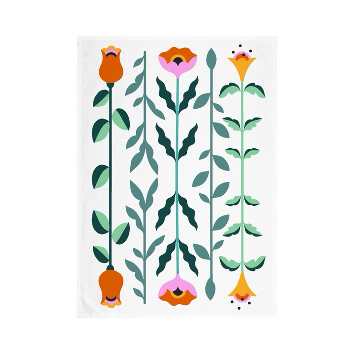 white towel with a floral design that features pink, orange and dark orange colors.