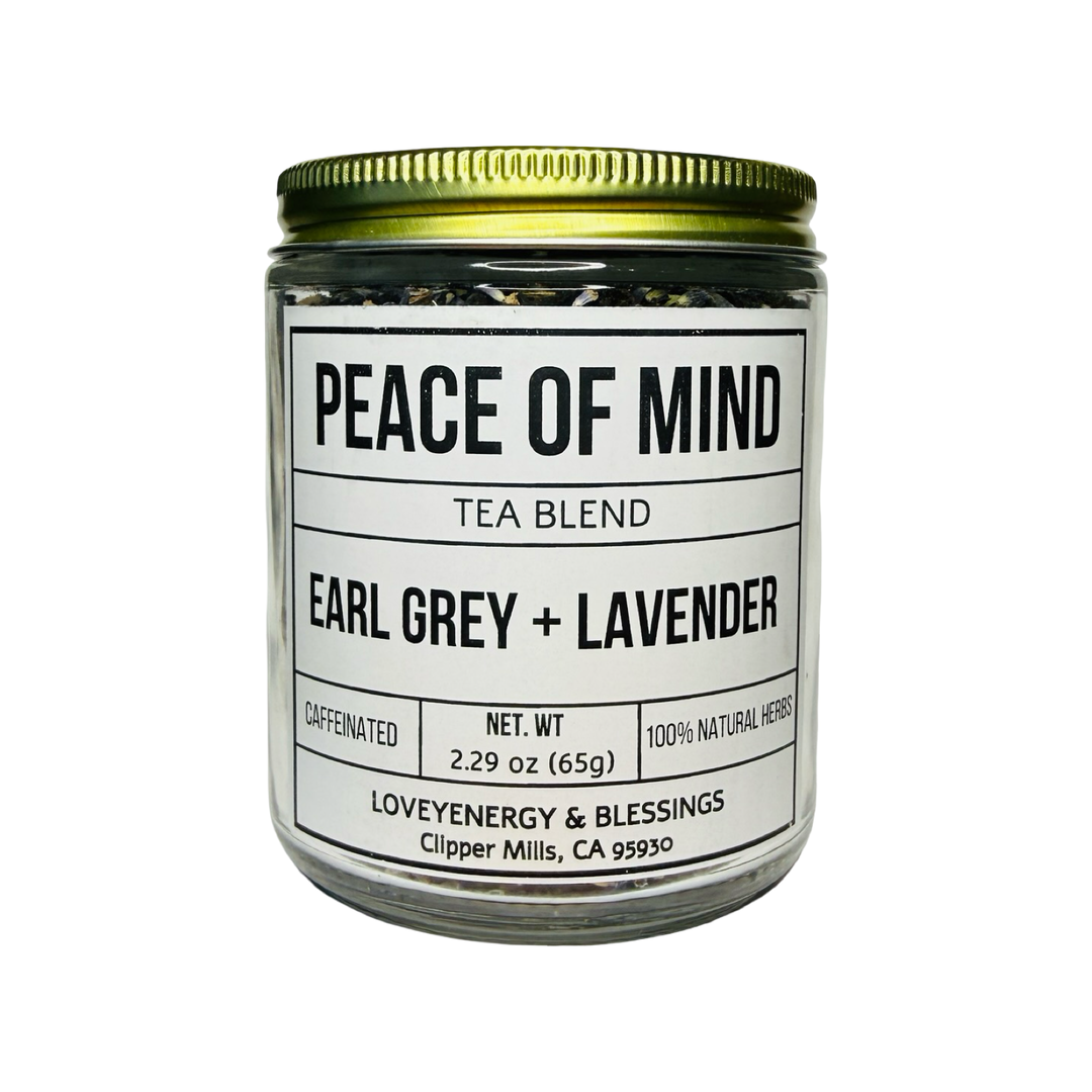 clear 2.29 oz jar of earl grey and lavender tea with a gold lid and white branded label.