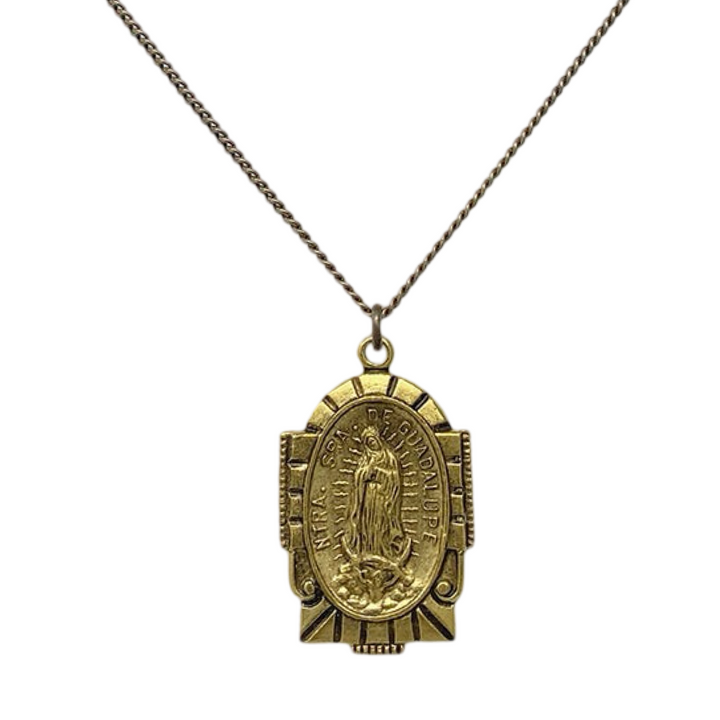 necklace with a pendant that  features an image of the Virgin Mary