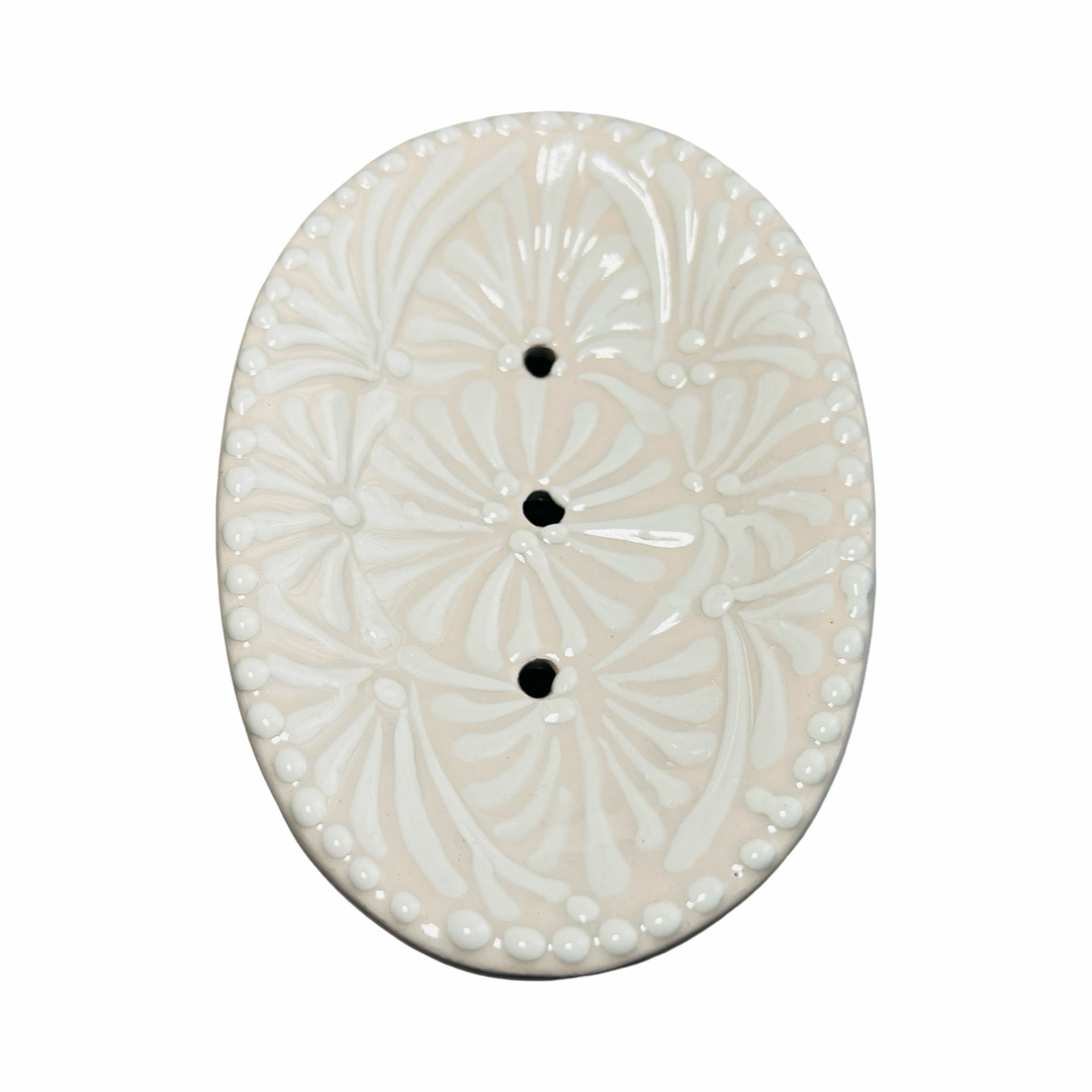 top view of a Puebla soap dish with a white and cream glazed design