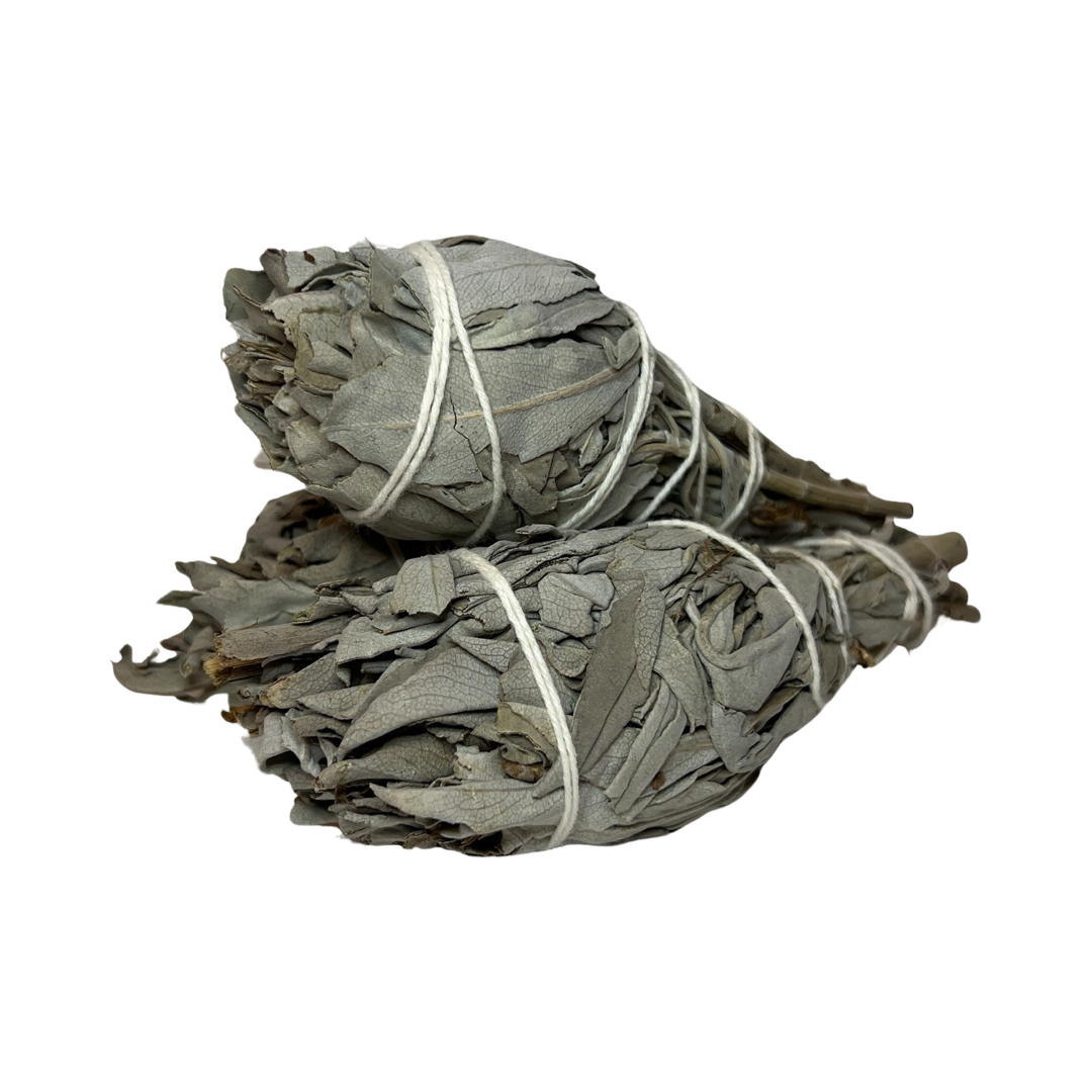 3 bundles of white sage wrapped in white twine