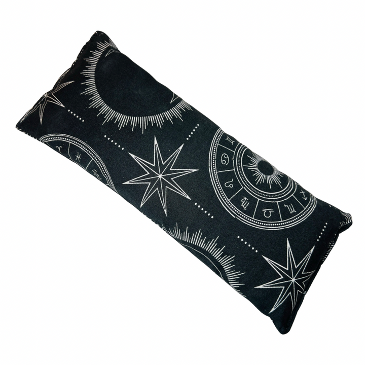 rectangle black eye pillow with an astrology design