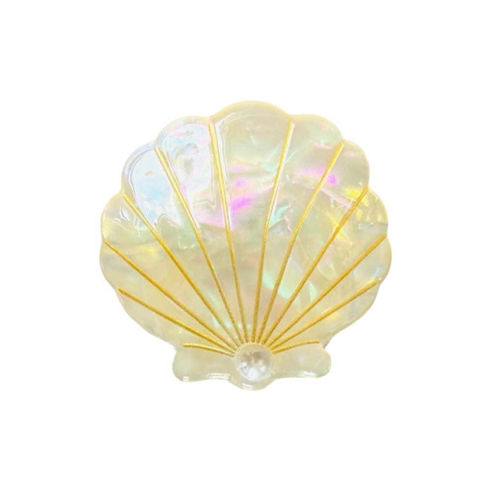 White Iridescent seashell-shaped hair claw clip with gold detailing and a pearl accent.