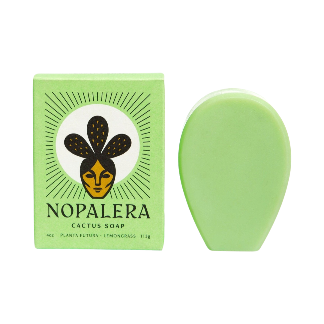green colored branded box of cactus soap on the side of a green cactus shaped bar of soap. Brand: Nopalera