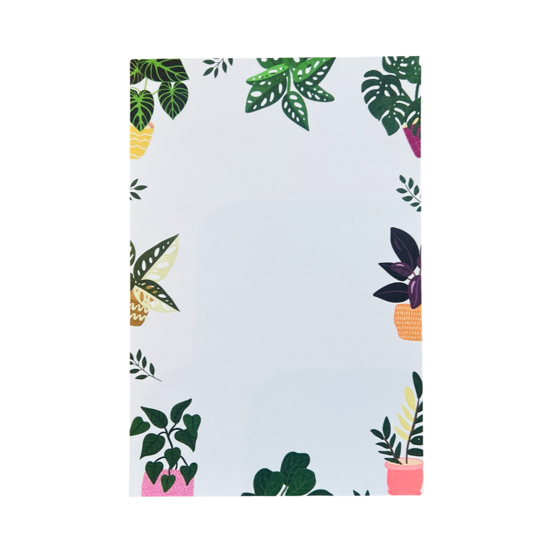 White notepad with a border of various potted house plants