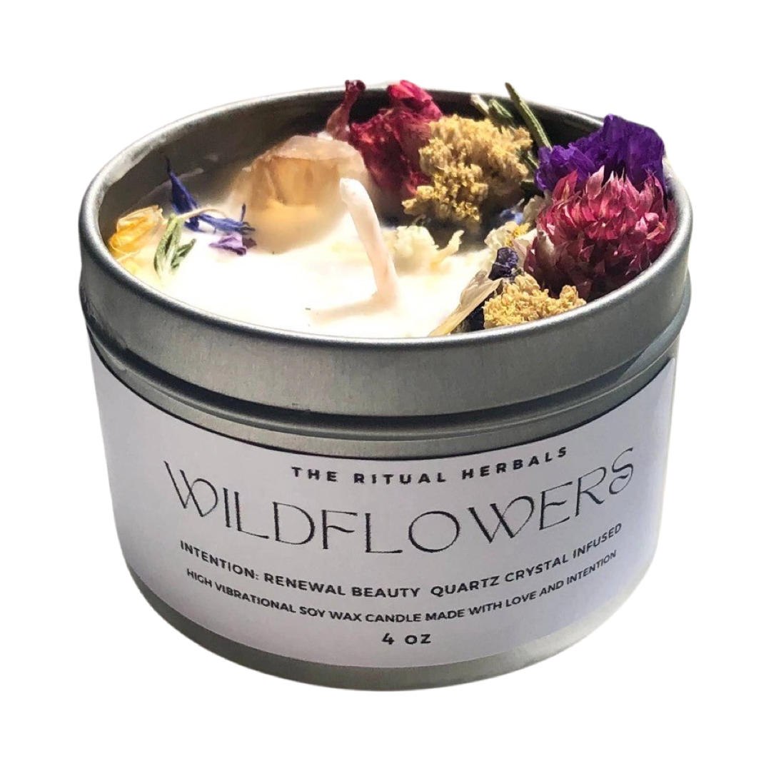4 oz silver tin with a white candle featuring crystals, dried flowers and a white branded label