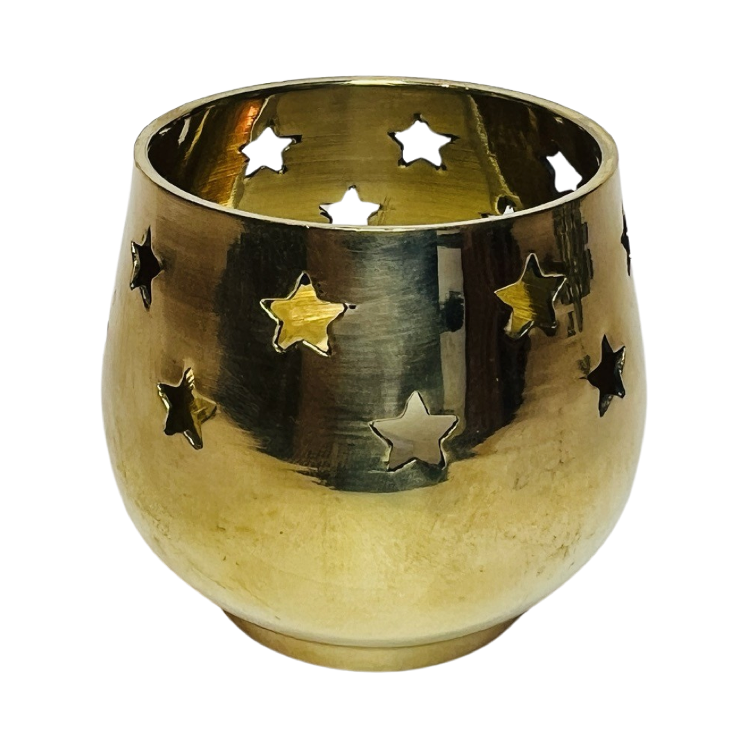 brass votive candle holder featuring star cutouts