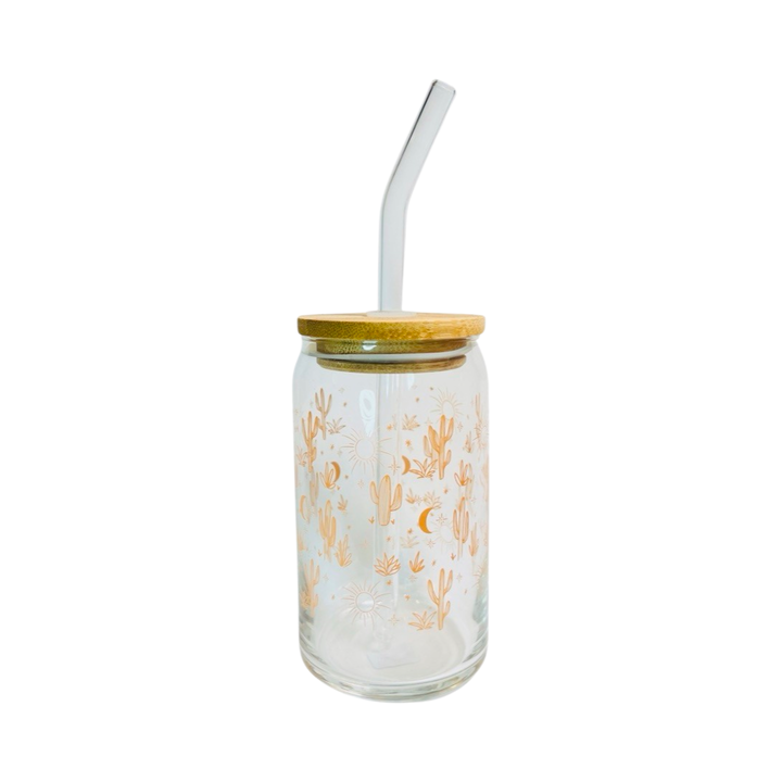 clear glass tumbler with a lid and glass straw and features an orange cacti and design