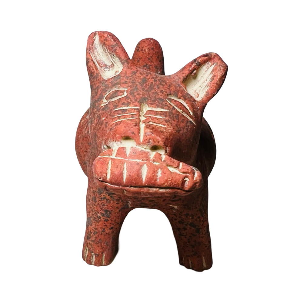 front view of a red clay dog figurine