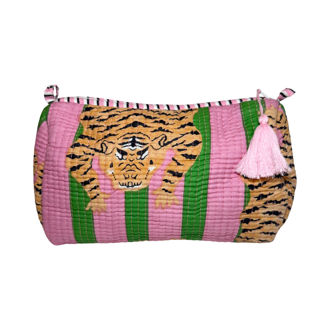 Quilted cosmetic bag with pink and green tiger print and a pink tassel zipper pull.
