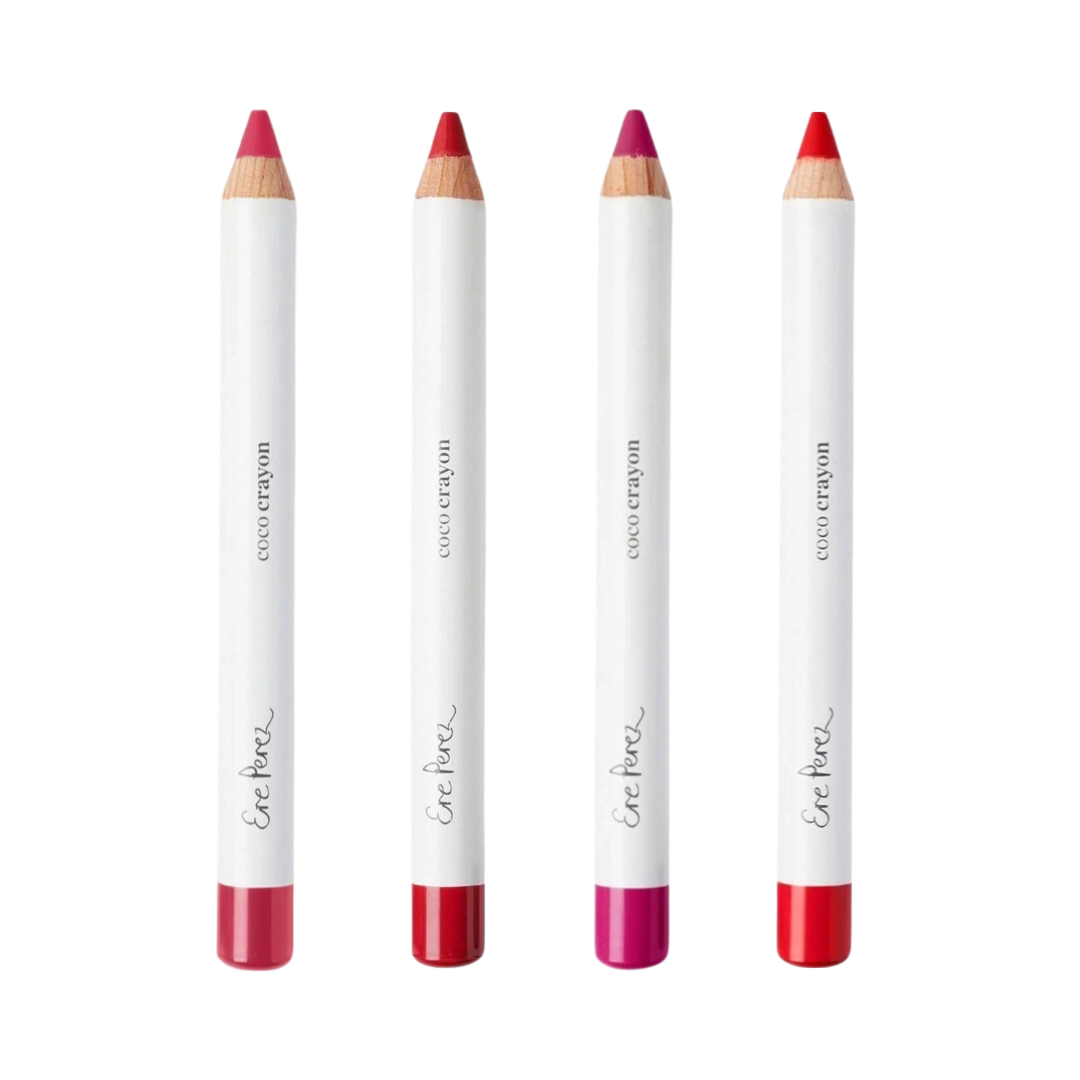 four lip crayons lined up one after another in white branded packaging and black lettering