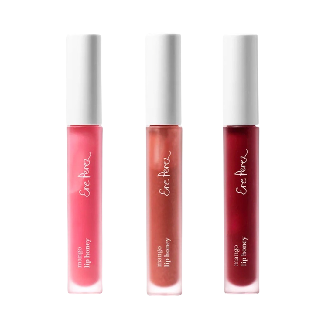 3 clear tubes of lip gloss in various shades of pink and red with white lids