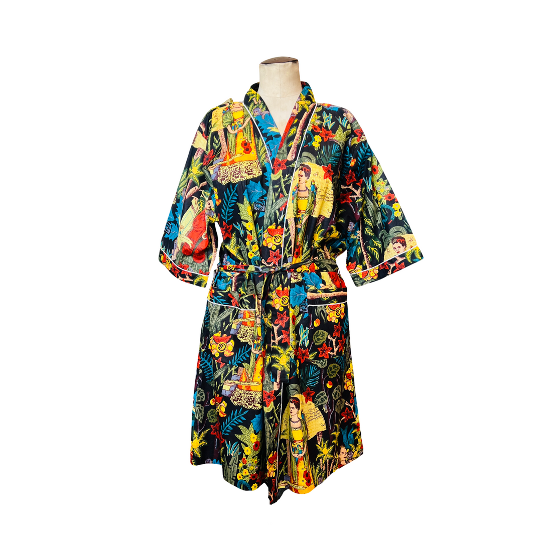 black robe with images of Frida Kahlo and a tropical setting.