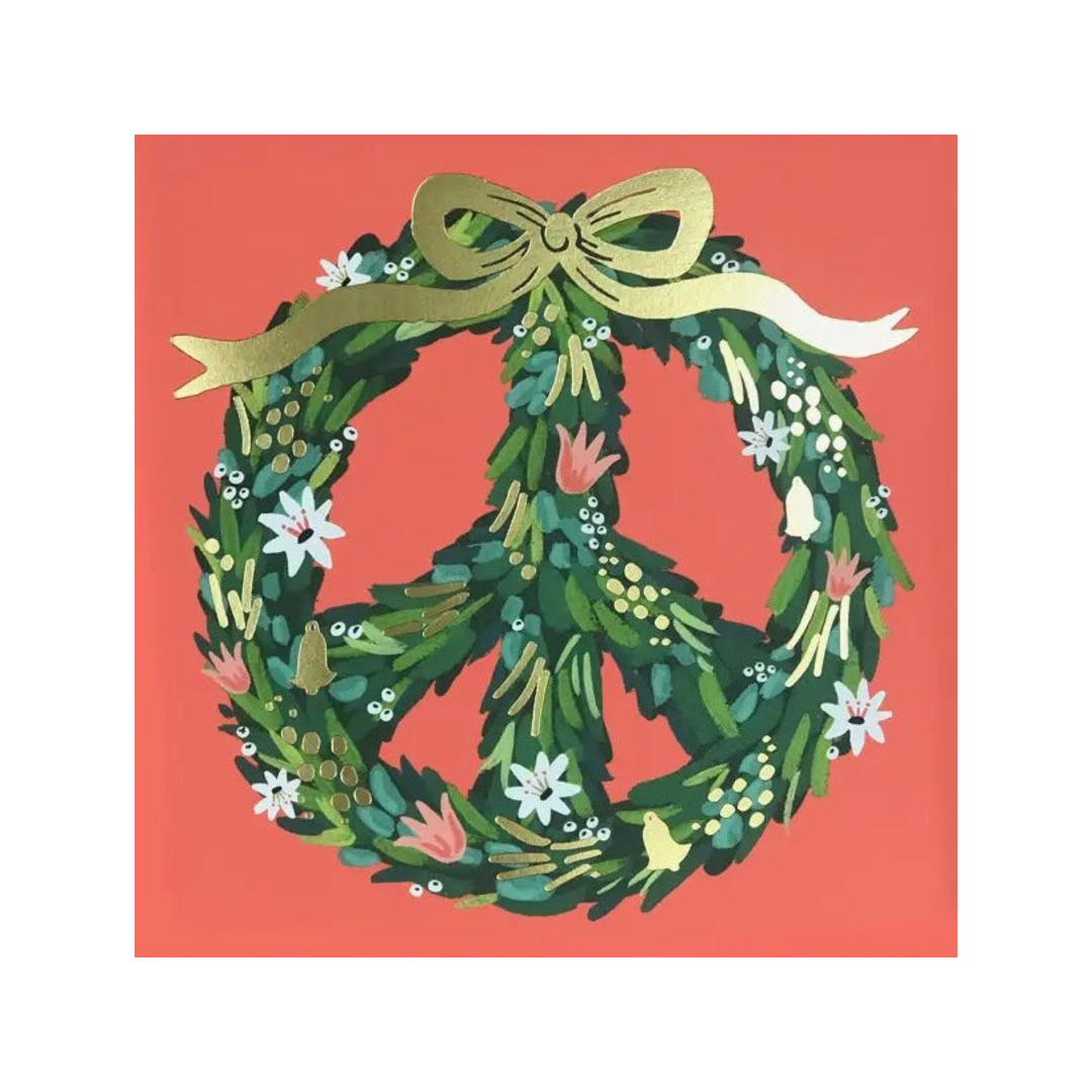 Red square card with a green wreath in the shape of a peace sign featuring gold accents and white and pink flowers.
