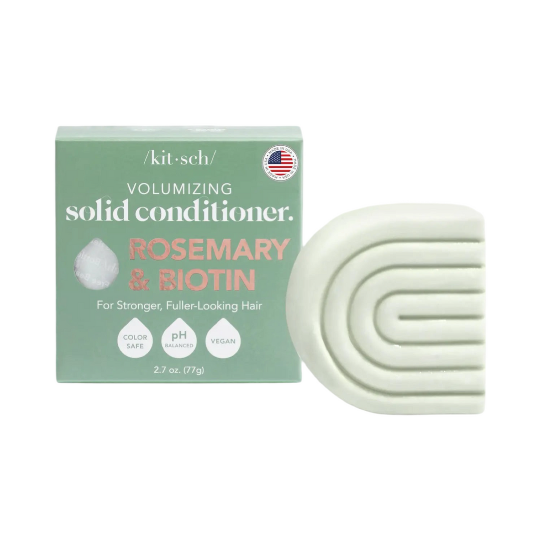 mint green branded box with a mint green "C" shaped bar of conditioner.