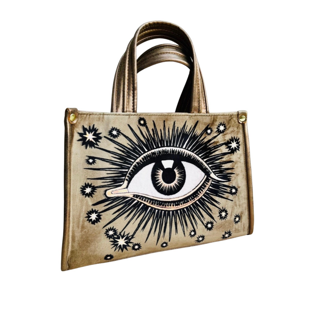 Slate  hand bag with an image of an eye with sunbursts and sun rays. Brand: La Funky Mexicana