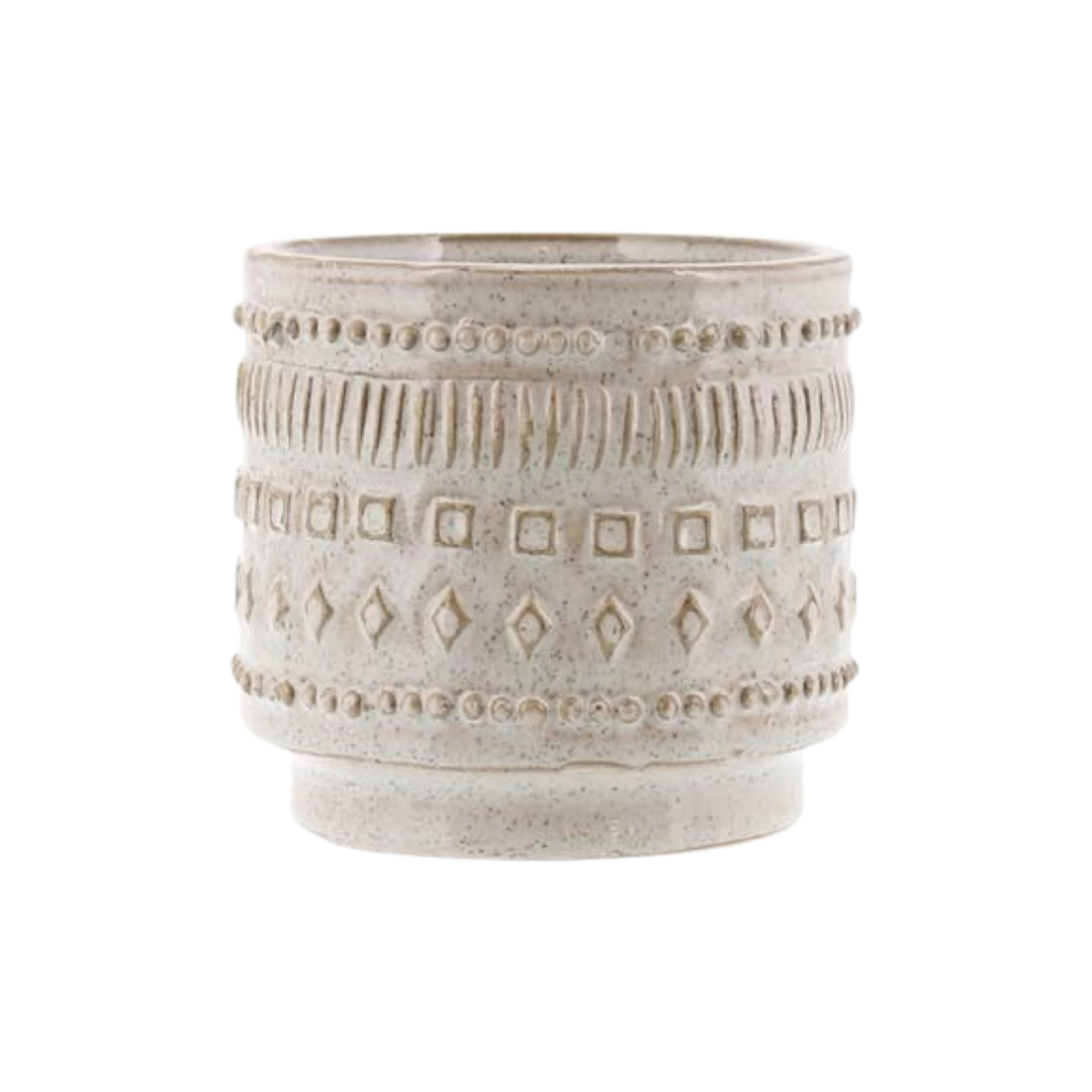 Creamy White ceramic cachepot with an design that features squares , diamonds, lines and circles
