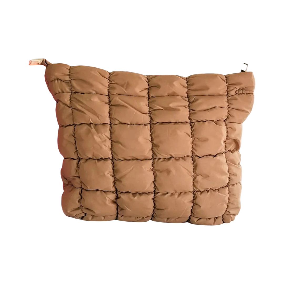 Quilted puffer makeup bags in brown with a textured, padded exterior.