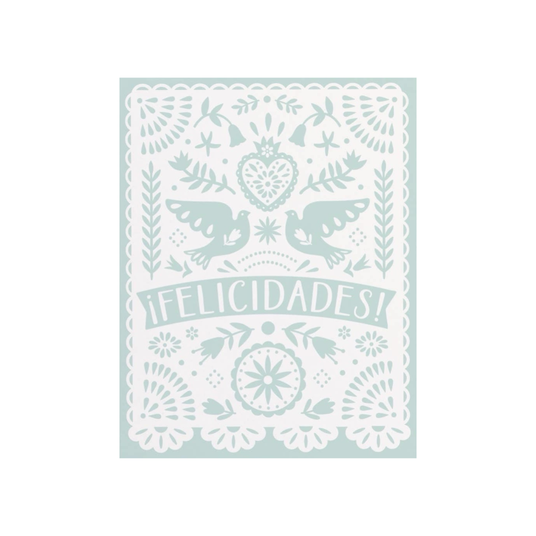 sage colored card with a white papel picado inspired design that features a heart, two doves, flowers and the phrase Felicidades.