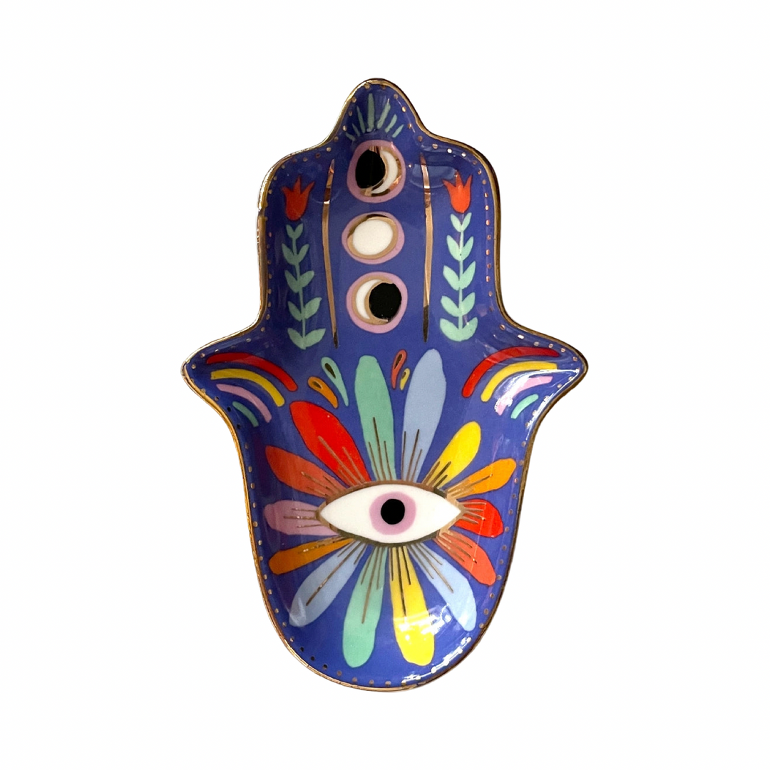Blue ceramic hamsa hand trinket dish with a colorful eye design.