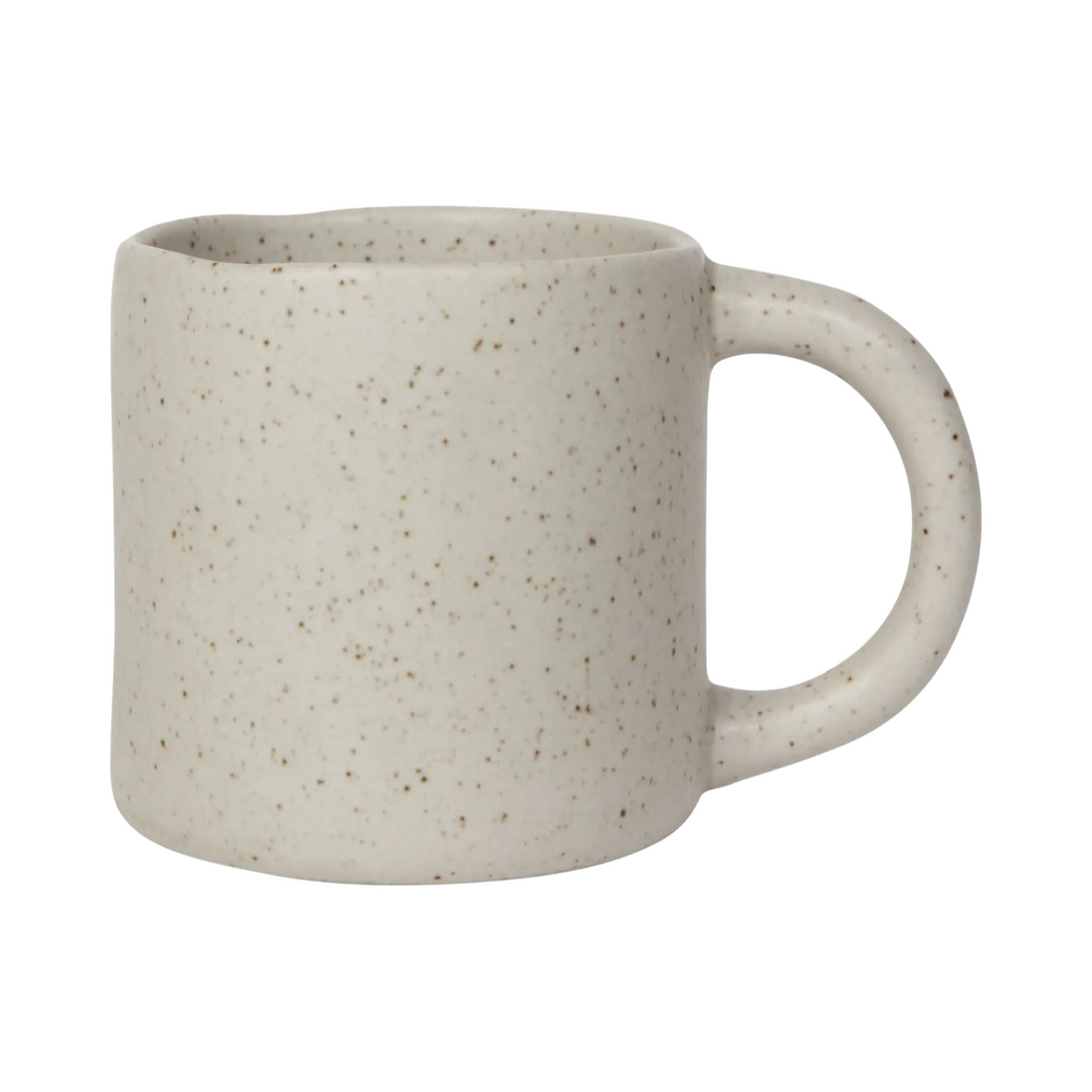 stone colored mug with brown speckles