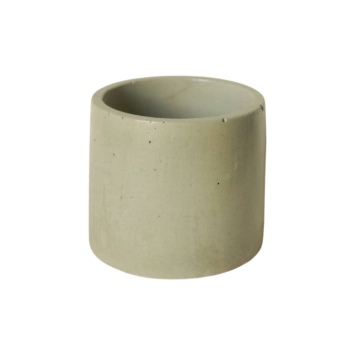 Green cylinder shaped candle vessel