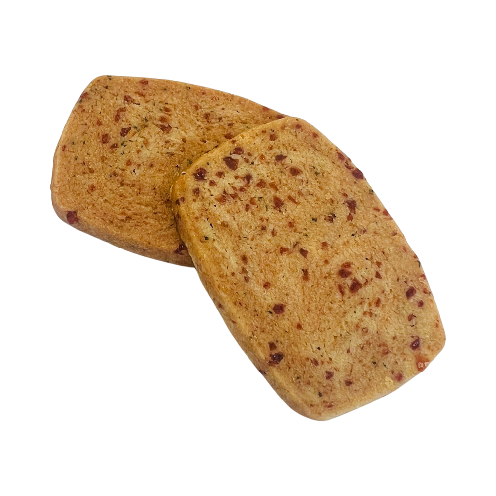two short bread cookies with speckles of guava