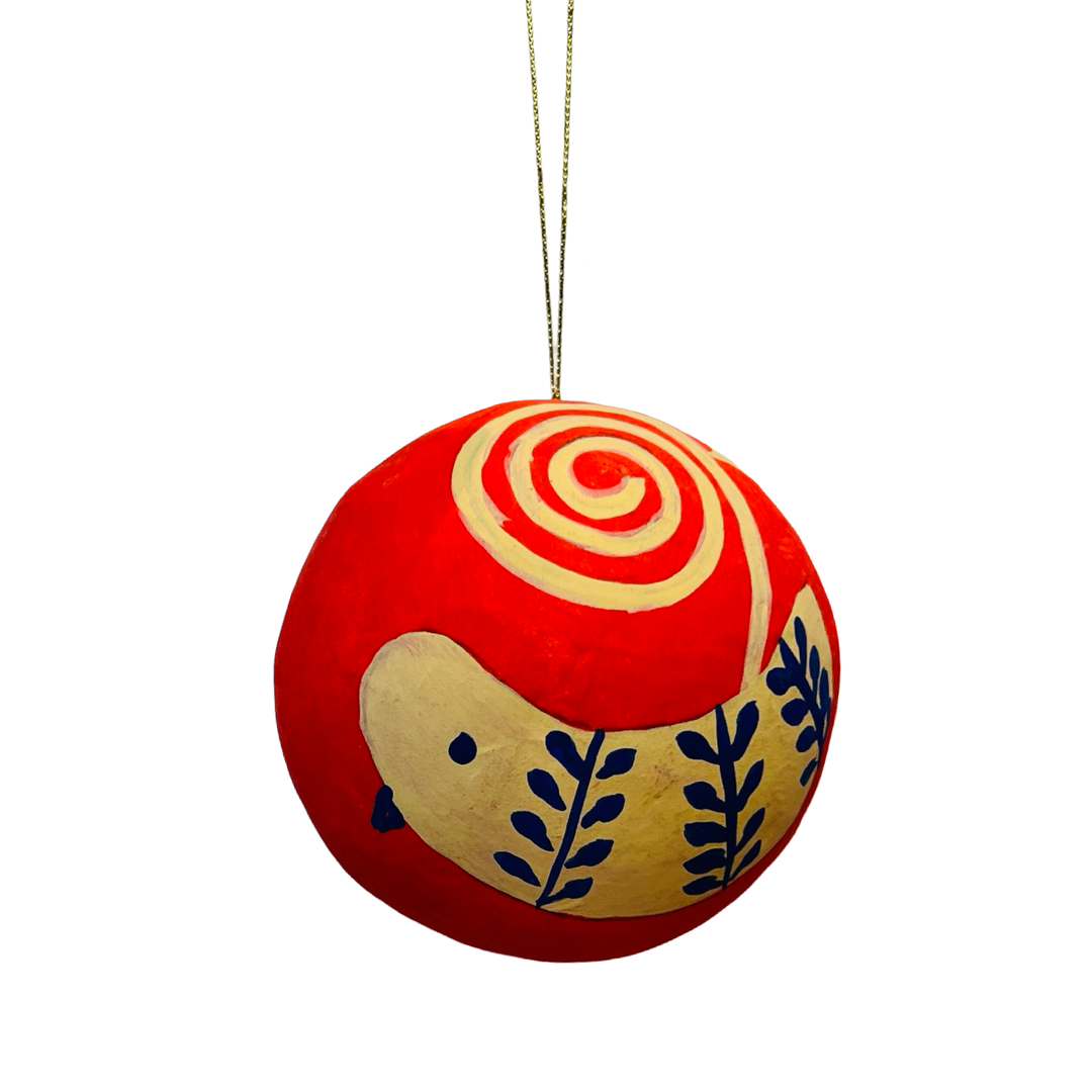 Hand-painted red papier-mâché sphere ornament featuring colorful bird design